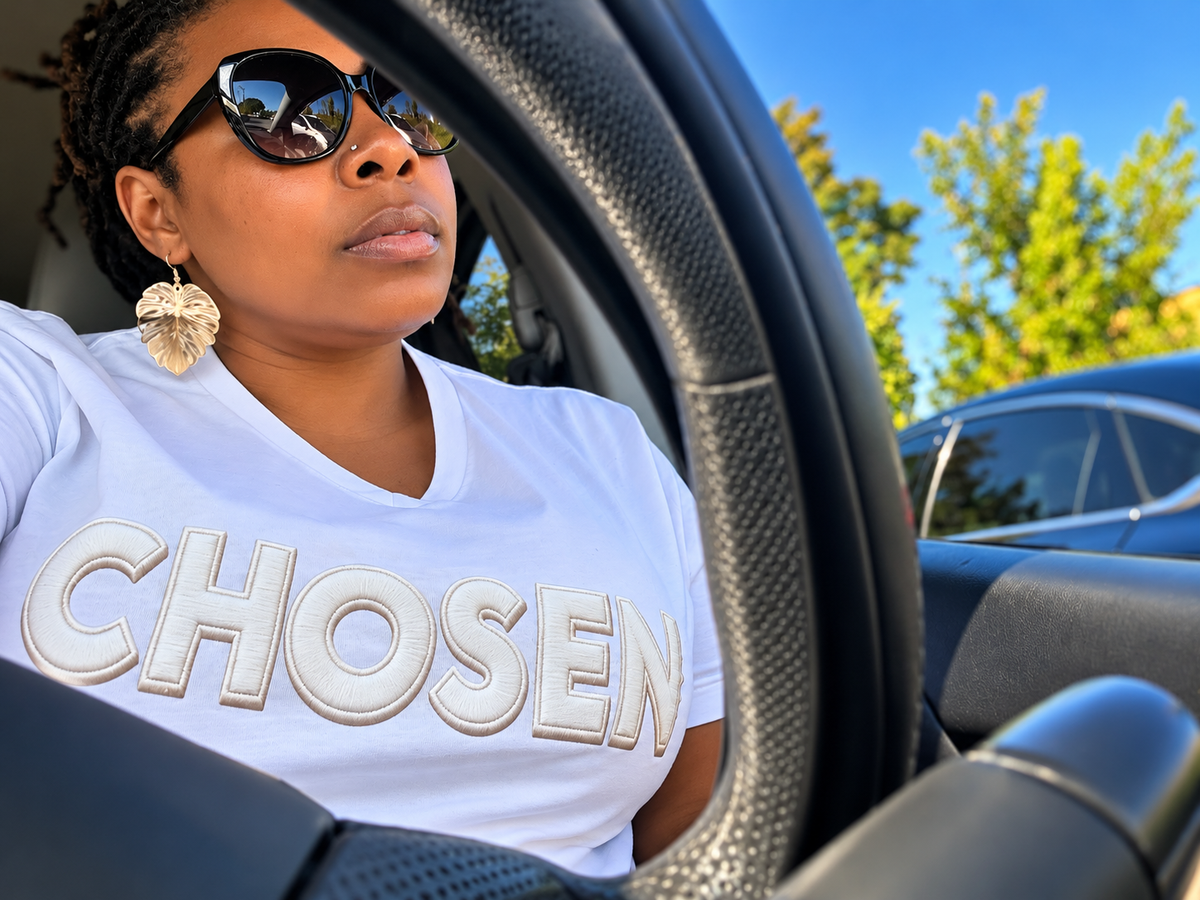 Lifestyle photo wearing white CHOSEN raised-letter V-neck T-shirt